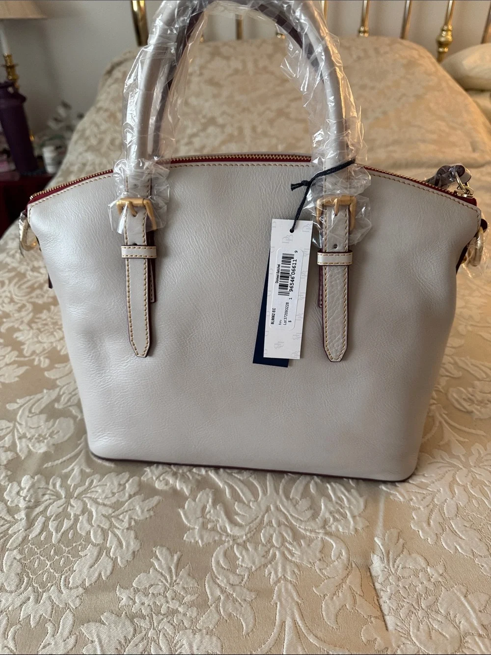Dooney & Bourke Pebble Leather Satchel in Cream with Red Trim